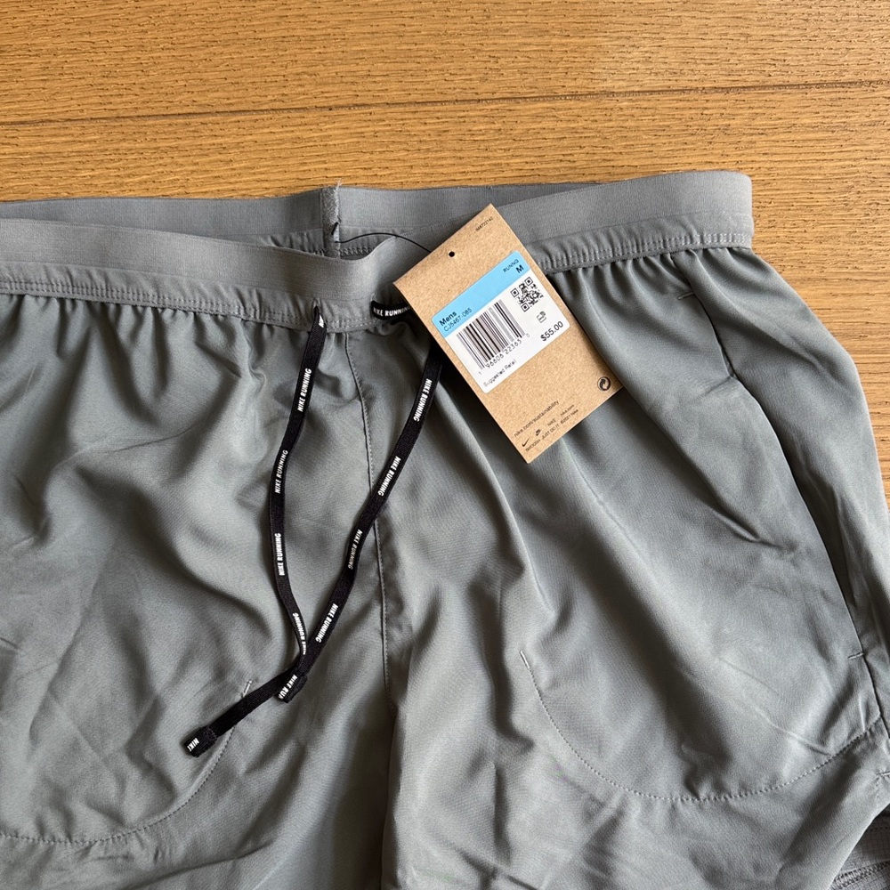 Grey Nike Running Shorts with Drawstring and Liner, standard fit 5” length.